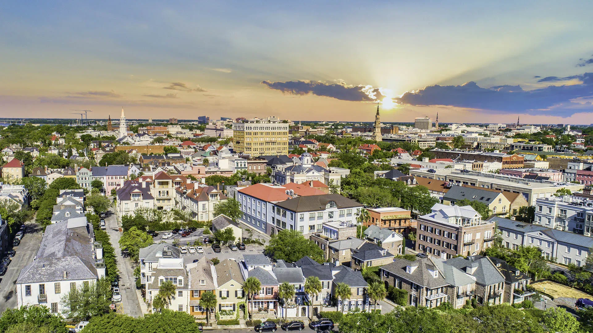 Charleston rooftops and church steeples at sunset